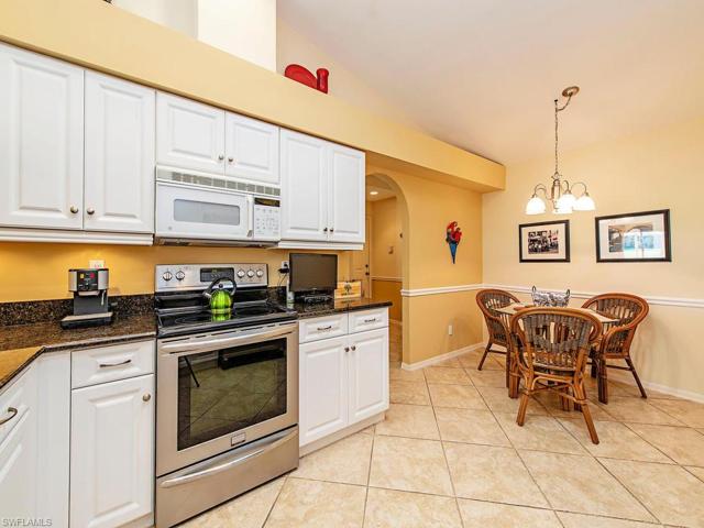 Eat in Kitchen with newer cabinets and Microwave vented to the outside!