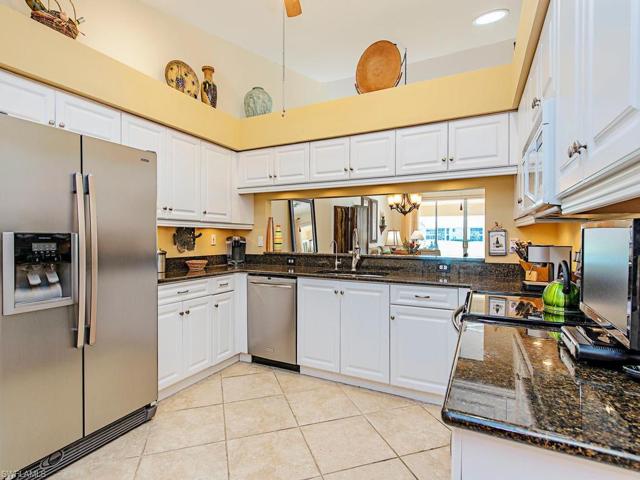 Renovated Kitchen and pass through looking out to dining, living and lanai areas.