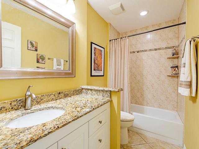 Renovated Guest bath with granite counter top.