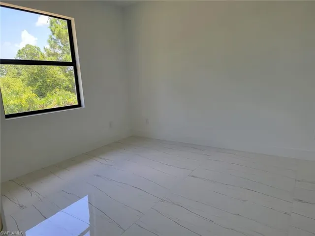 View of tiled empty room