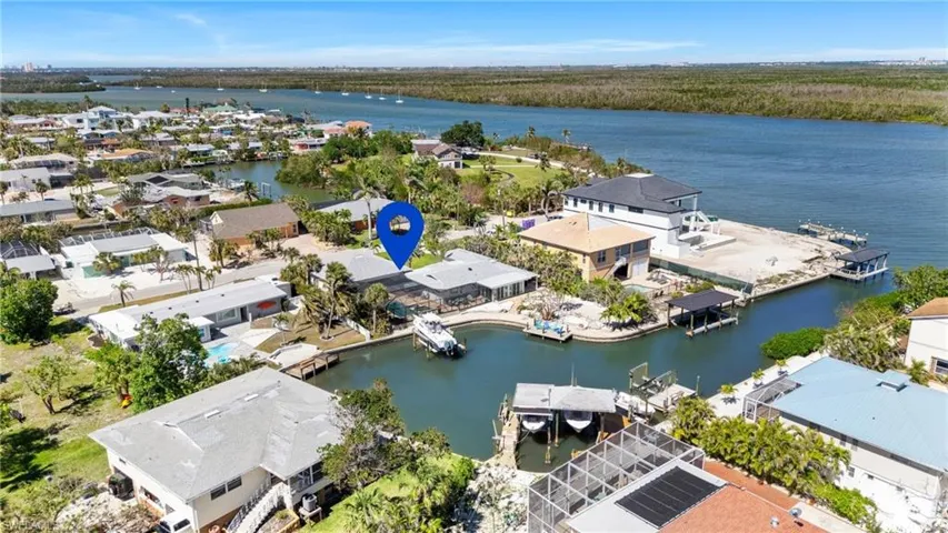 Bird's eye view featuring a residential view and a water view - Virtually Edited Image