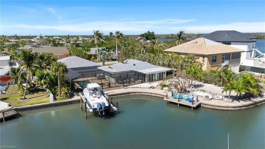Drone / aerial view with a water view - Virtually Edited Image