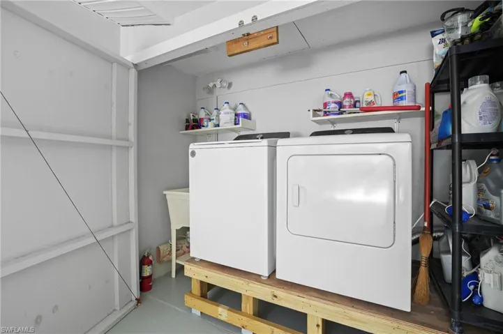 Washroom featuring laundry area and independent washer and dryer. Virtually Edited Image