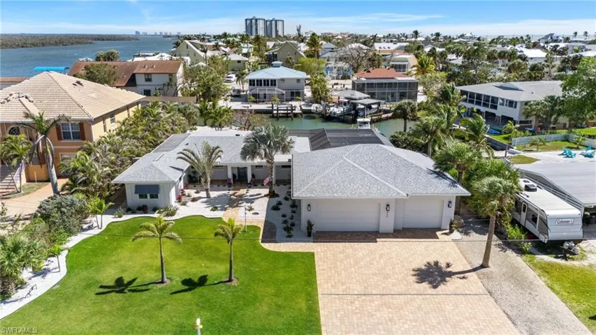 Aerial view featuring a residential view and a water view - Virtually Edited Image