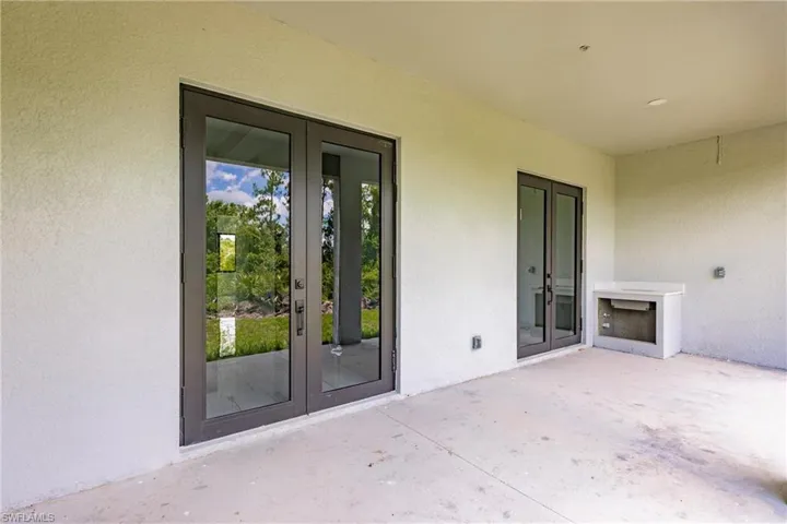 View of terrace featuring french doors