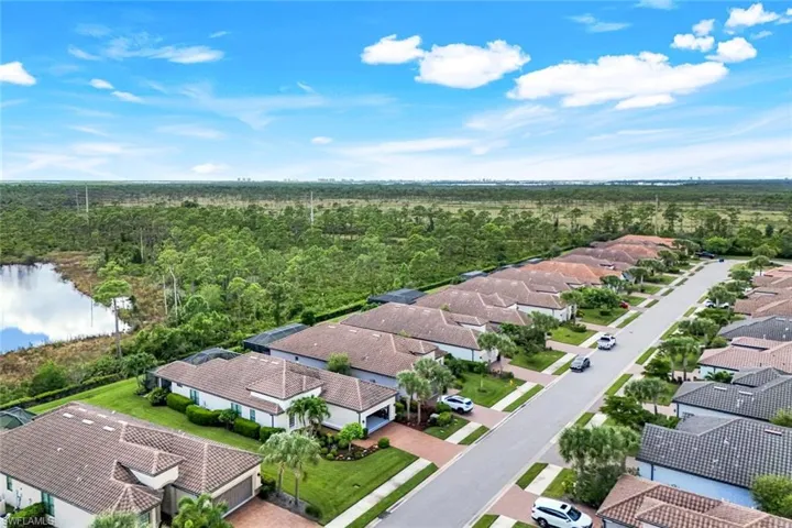 Aerial view of residential area with a nearby body of water