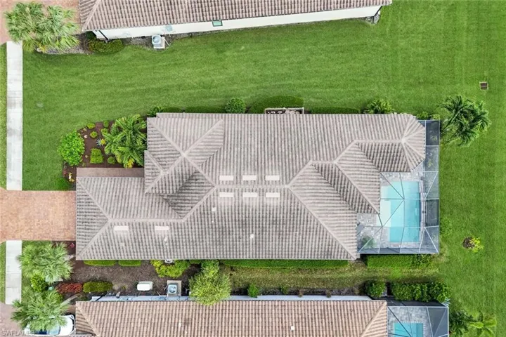 View of subject property with a pool area