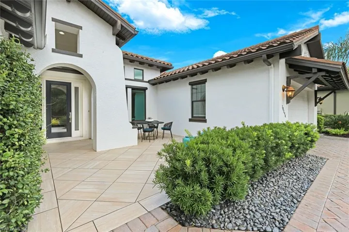 Tile paver front courtyard with water feature