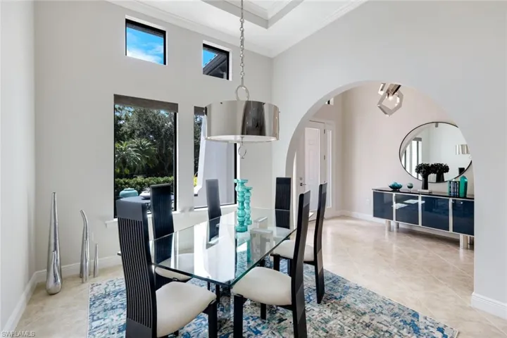 Designer lighting in dining and foyer