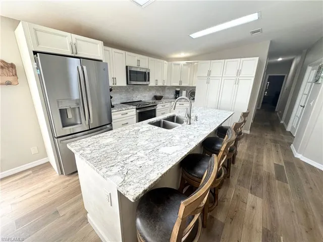 Granite countertops and stainless steel appliances