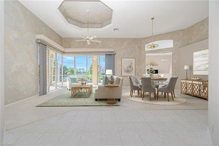 virtually staged great room / dining room