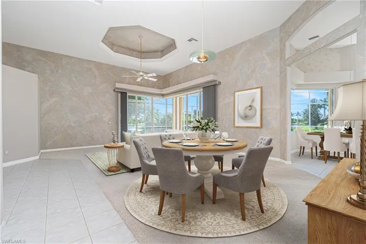 virtually staged great room / dining room