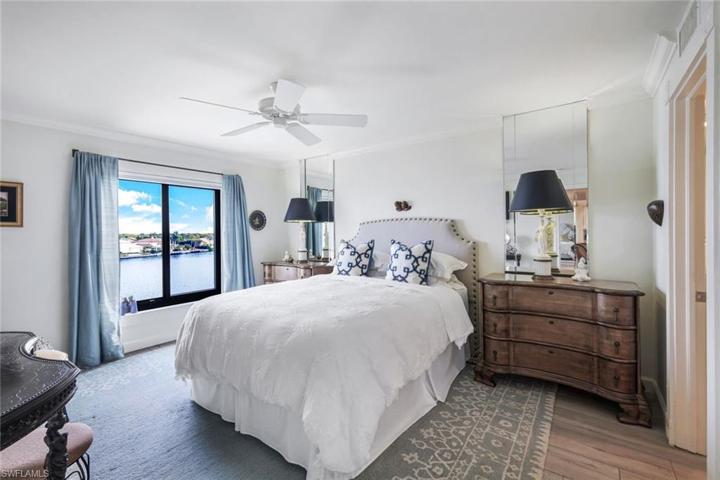 Primary Bedroom with stunning sunrise over the Bay views