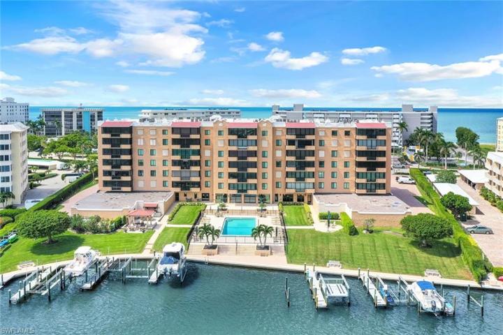 The Madrid, perfectly located on Venetian Bay Across the street from Naples famous white sandy beach