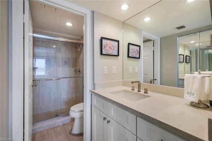 Second en-suite bath with a step-in shower and large walk-in closet