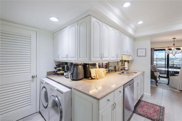 cleverly tucked into an alcove next to a handy storage closet