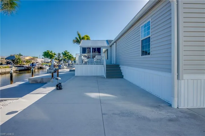 View of patio / terrace with a water view