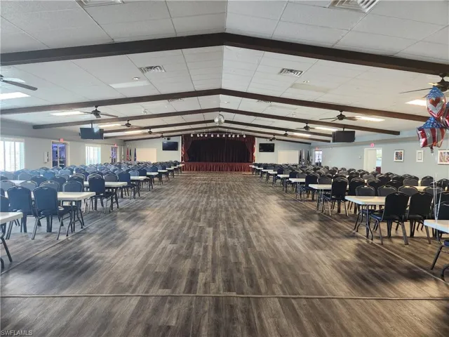 Misc room featuring hardwood / wood-style flooring and ceiling fan