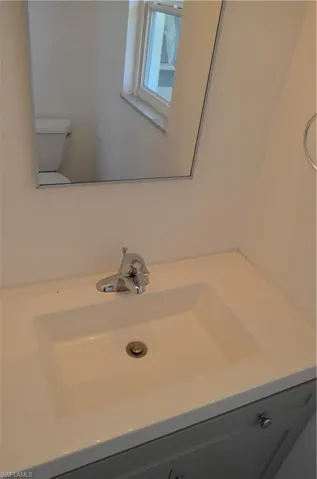 Bathroom with vanity and toilet