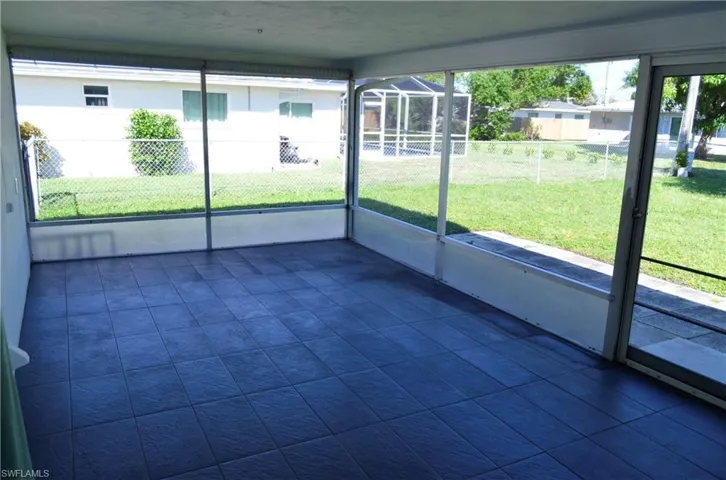 Unfurnished sunroom with healthy amount of natural light