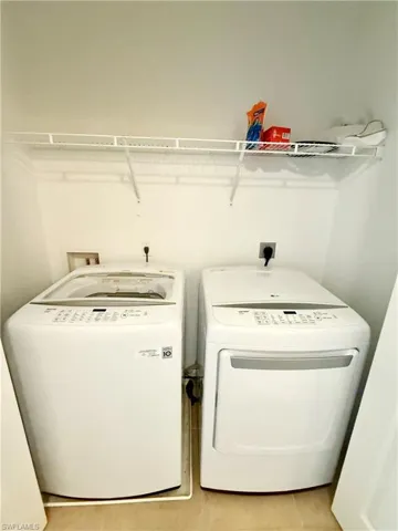 Laundry room featuring washer and dryer