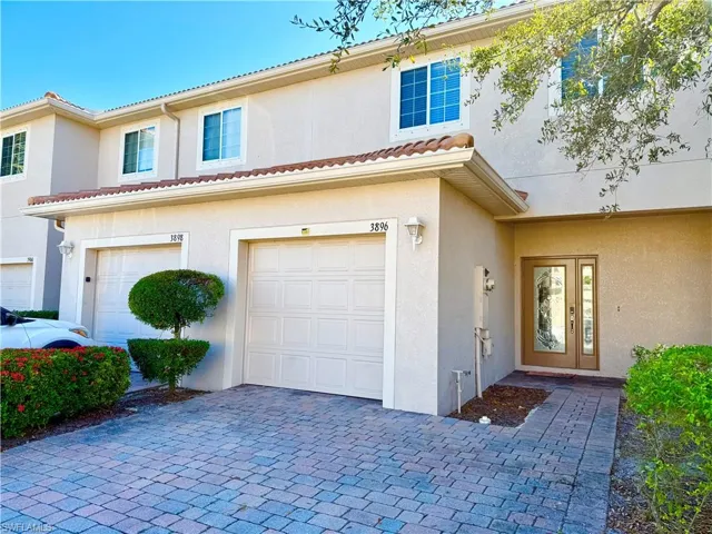 View of front facade with garage