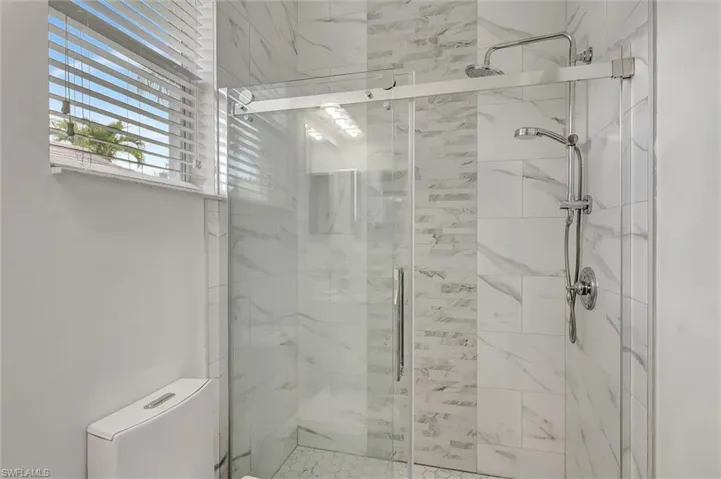Bathroom featuring a stall shower