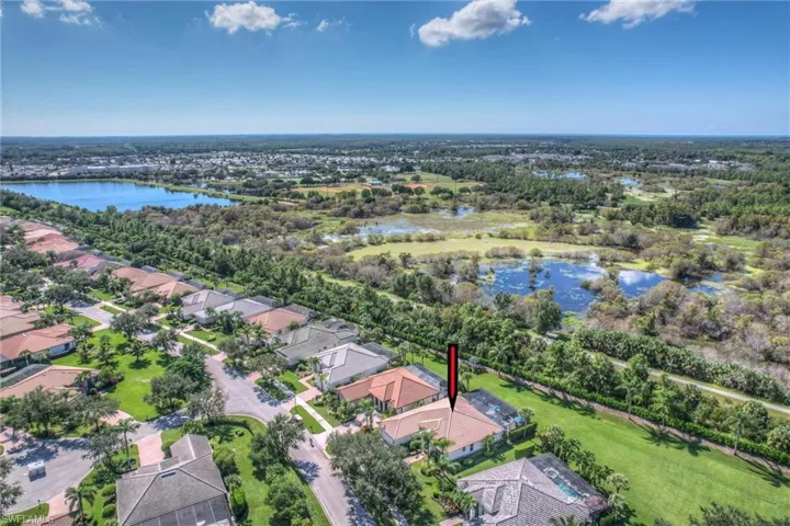 Aerial view of residential area with a nearby body of water