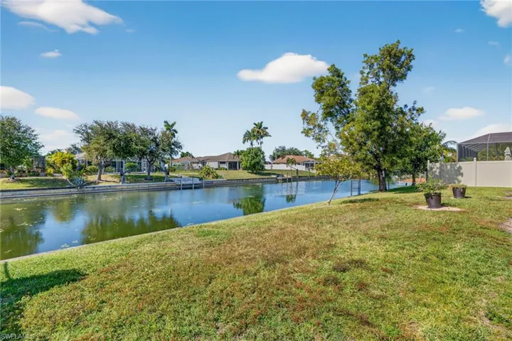 Freshwater canal view with direct access to 7 miles of boating and 3 lakes.