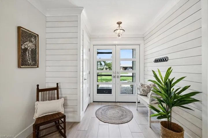 Entryway featuring Ship Lap and french IMPACTdoors