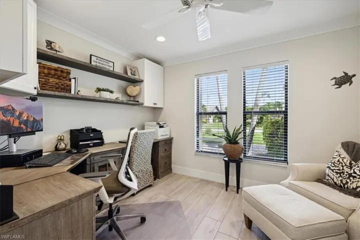 Office featuring ceiling fan & Window