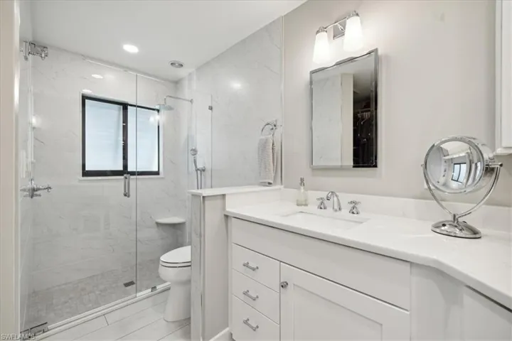 Dual Sinks, Make up Area and Walk in Shower