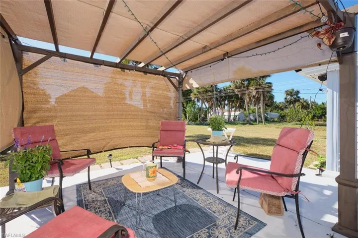 View of patio with a pergola