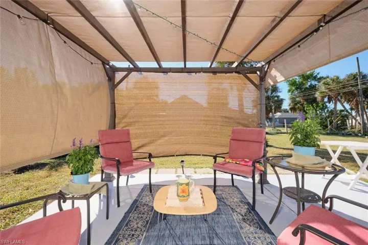 View of patio featuring a pergola