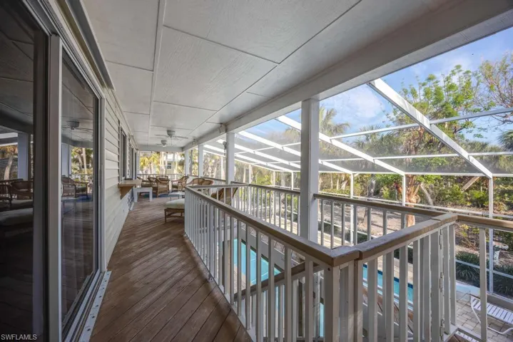 Wooden terrace with a lanai