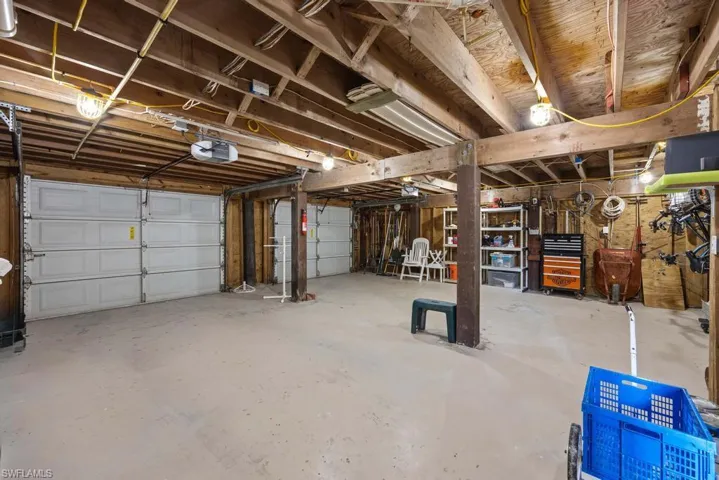 Garage featuring a garage door opener