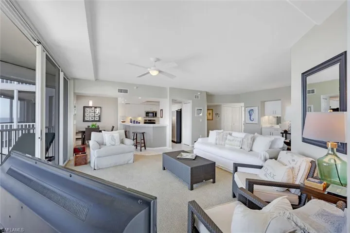 Living room and kitchen flow seamlessly together.