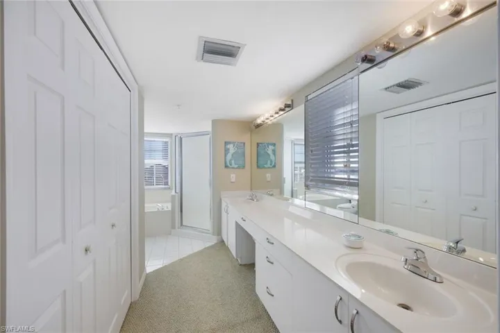 Double vanity master bath and walk in closet.