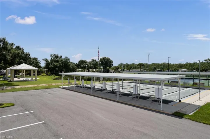 View of car parking with view of scattered trees