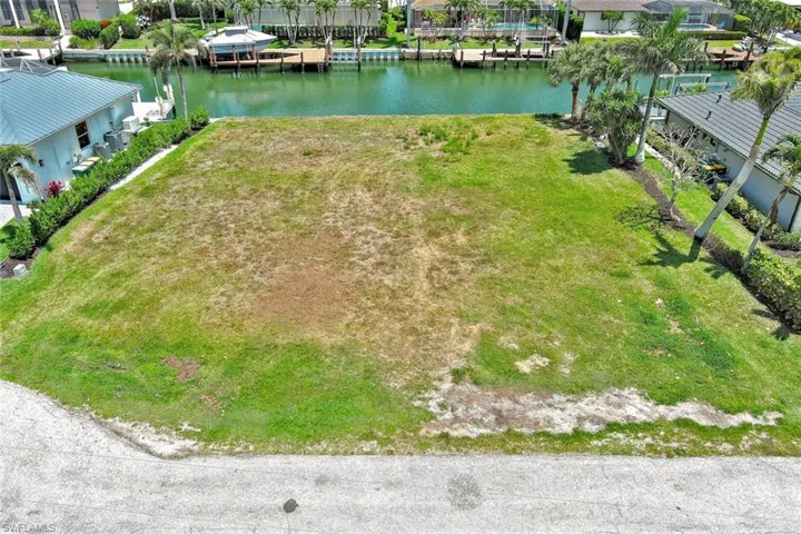 Bird's eye view with a water view and a residential view