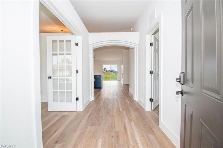 Front Entry with French Doors to the left leading to the Den/Media Room