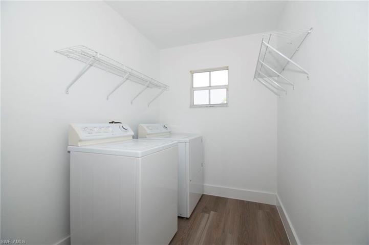 Laundry Room off of the kitchen leading to 2 car garage