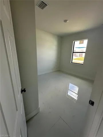 Empty room with baseboards