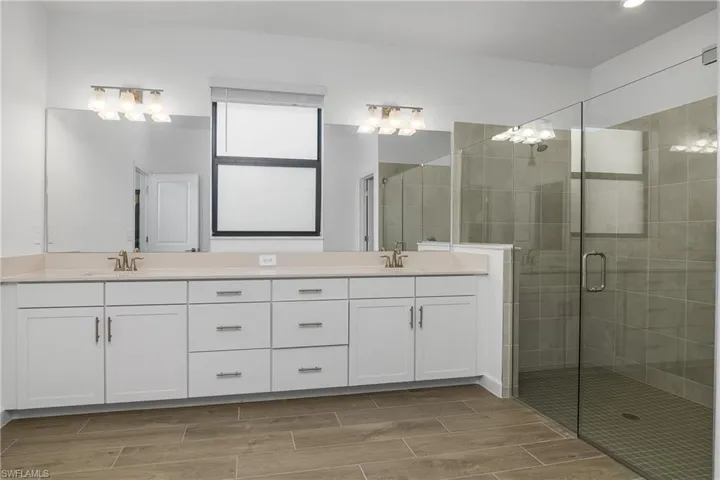 Owner suite with entry to HUGE walk-through closet, giving you easy access to the laundry room.