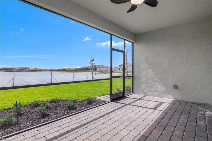 Private enclosed lanai is spacious and features a lighted ceiling fan and fabulous water view.