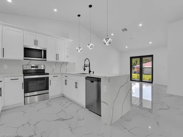 2440/2442 Richard Ave S, Lehigh Acres, Florida 33973