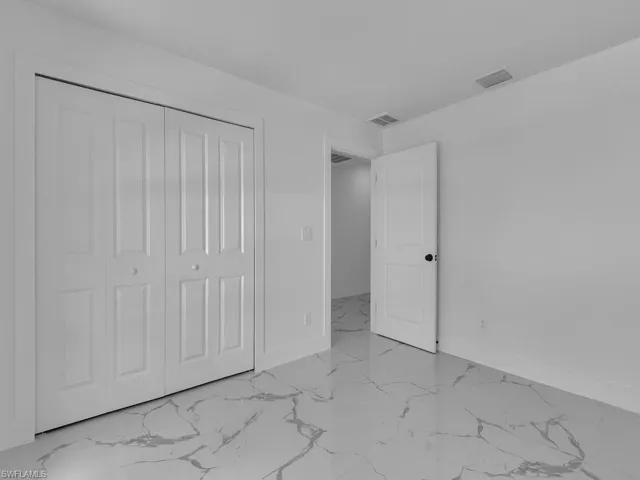 2440/2442 Richard Ave S, Lehigh Acres, Florida 33973