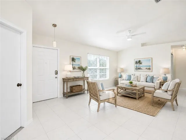 Original tile is underneath carpet.  Virtually Staged Photo