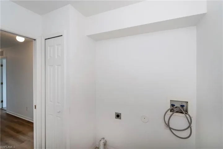 Laundry Room with Storage Closet