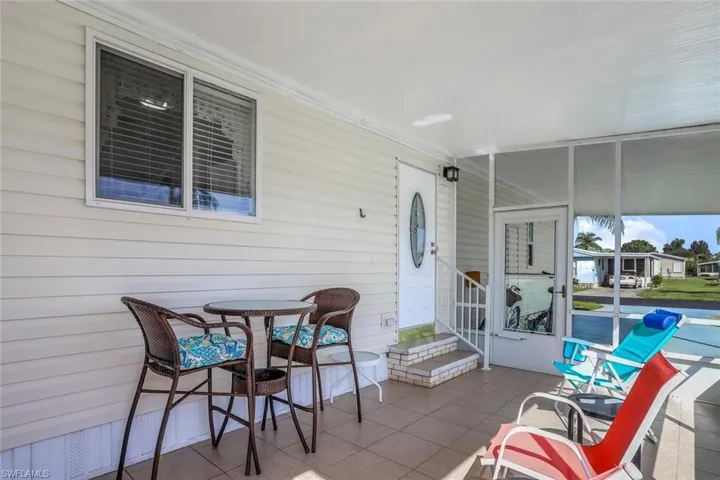 Screened lanai is in addition to carport, open patio and Florida Room.